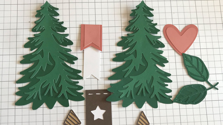 Glue the cut Cricut scrapbook pieces together