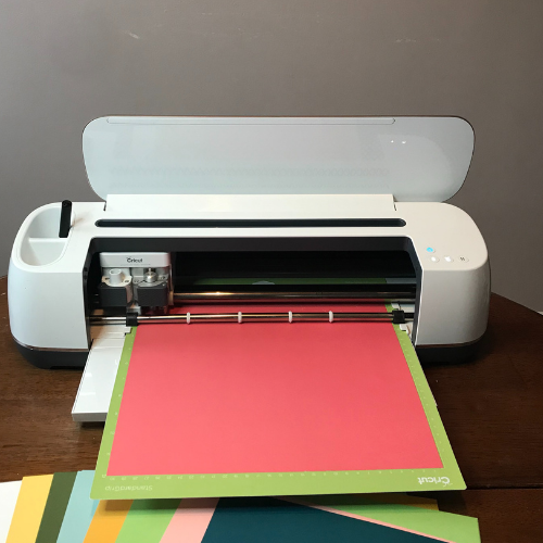 Cricut Maker cutting the card stock for the Cricut Spring Scrapbook pages