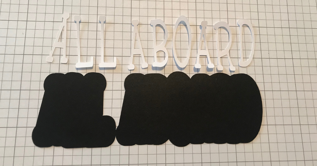 Cricut cut card stock with text and offset shadow from Design Space