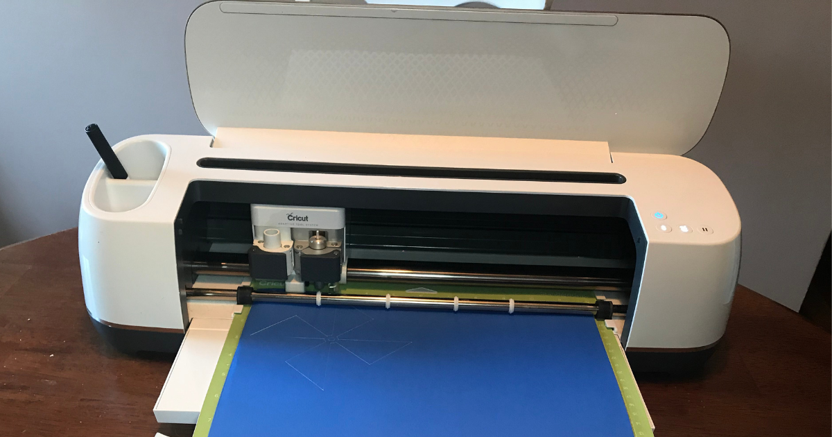 Cricut maker cutting the card stock for 4th of July Cricut project