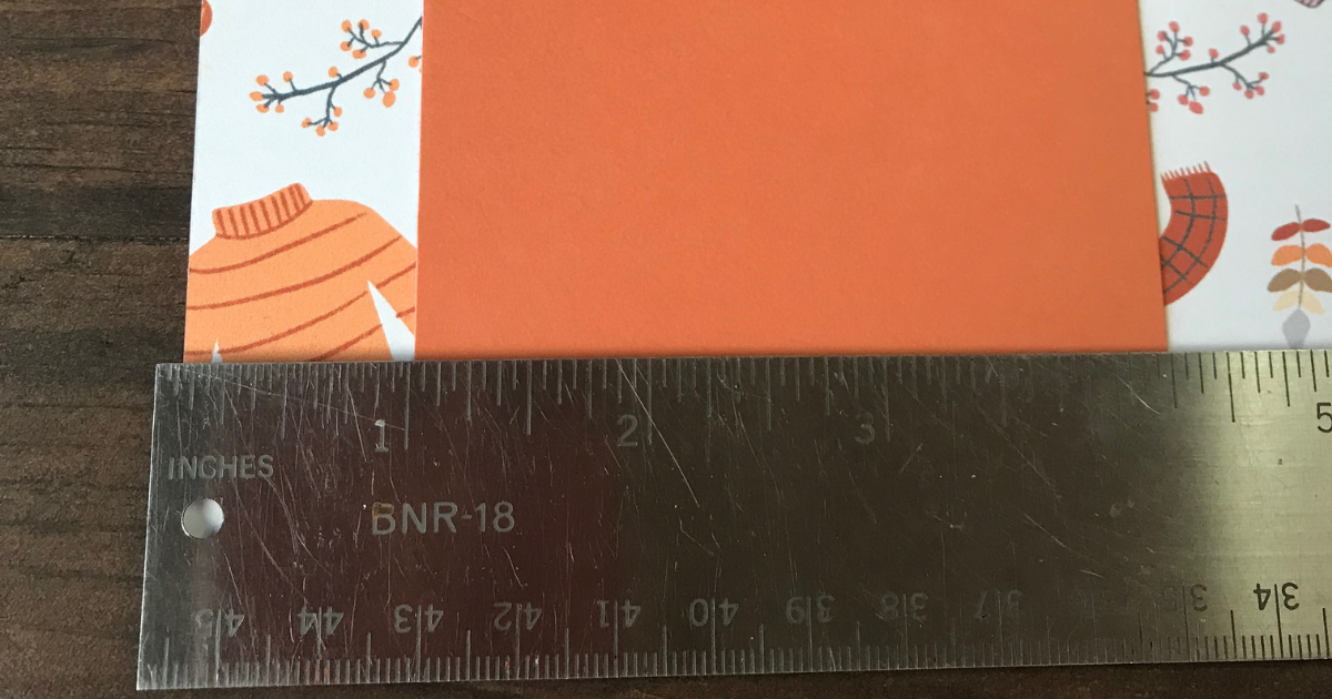 Start glueing the squares and rectangles 1 inch from the edge of the paper 