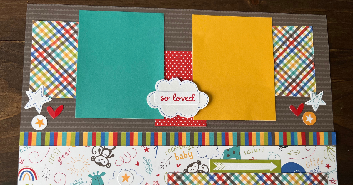 using stickers to decorate the scrapbook page 